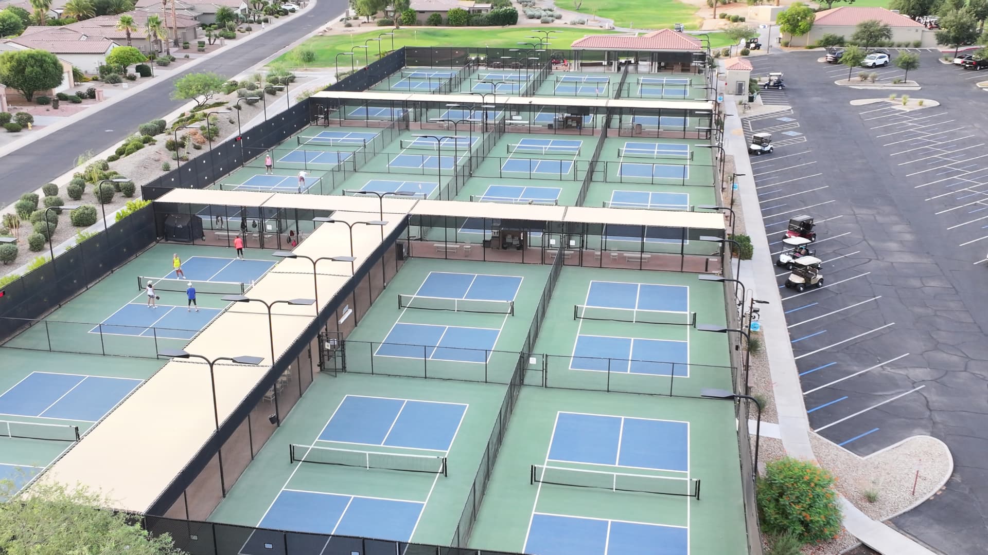 Aerial view of the shaded pickleball court complex at The Grand in Surprise, Arizona